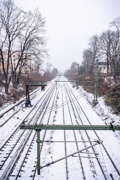 View of the rails in the snow from the bridge in Hamburg in winter.