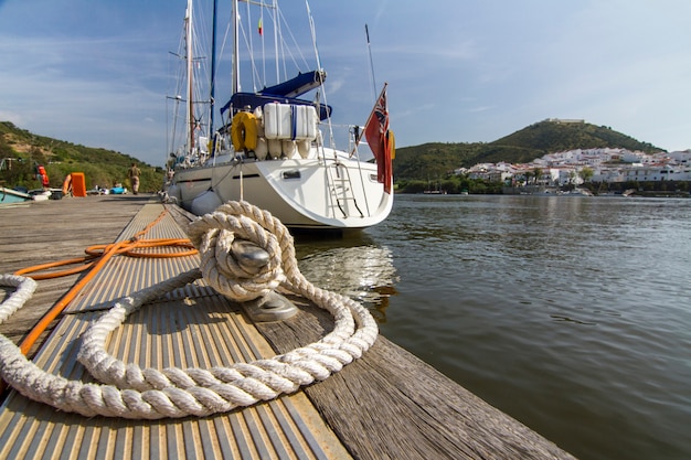 View of a recreational sailboat on the Guadiana river located in Portugal.