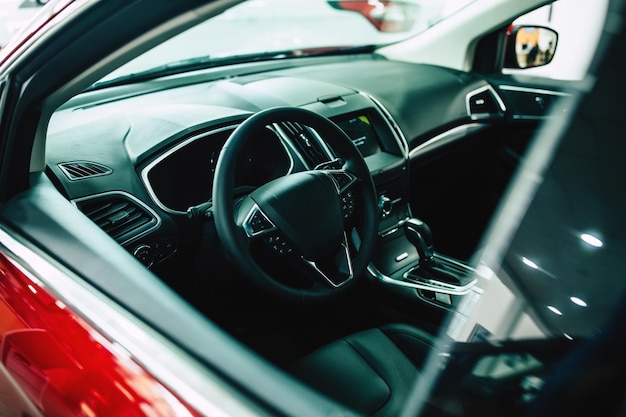 View of row new car at dealership indoors