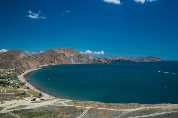 view of the sandy seashore from above