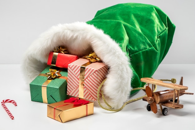 View of santa claus bag with presents and toys