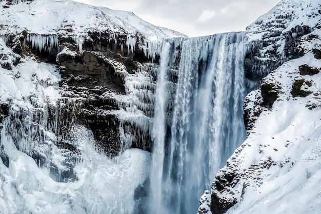 Photo view of skogafoss waterfall in winter