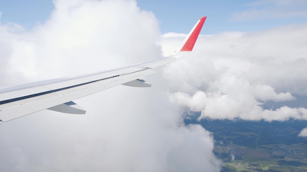 View of the sky with clouds from airplane window