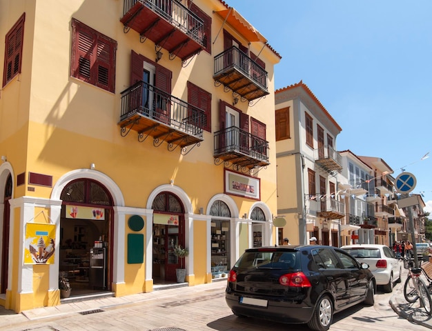 View of streets of Old Town with tourists and shops in Nafplion Peloponnese Greece