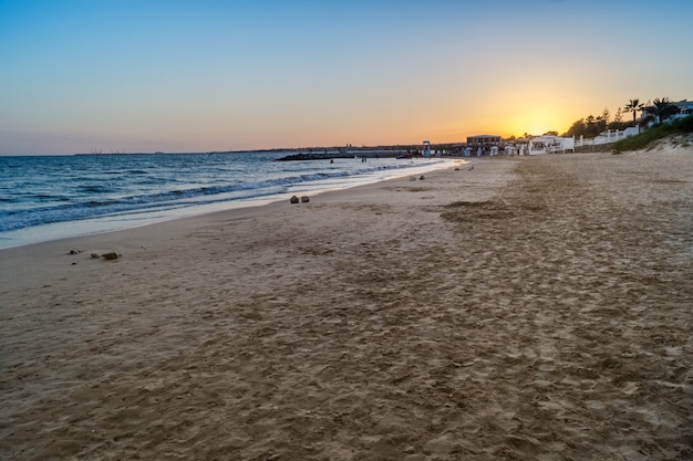 View at sunset on the beautiful beach of Pozzallo, Sicily