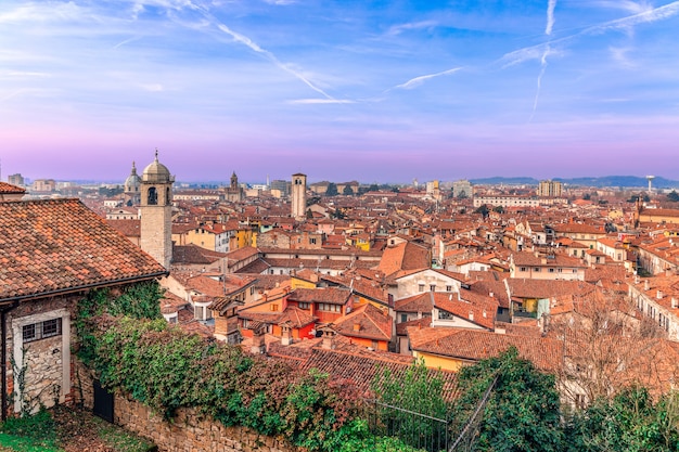 View at sunset on the roofs of the old town of Brescia in Italy