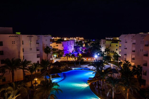 View on a swimming pool in hotel resort at night