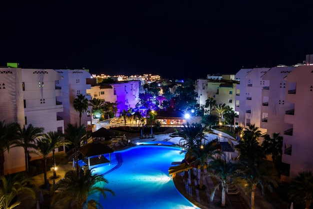 View on a swimming pool in hotel resort at night