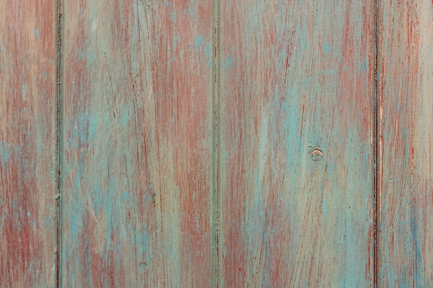 View of textured colorful wooden table.