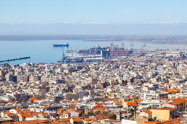 View of Thessaloniki city, the sea, ships and the olympous mountain.