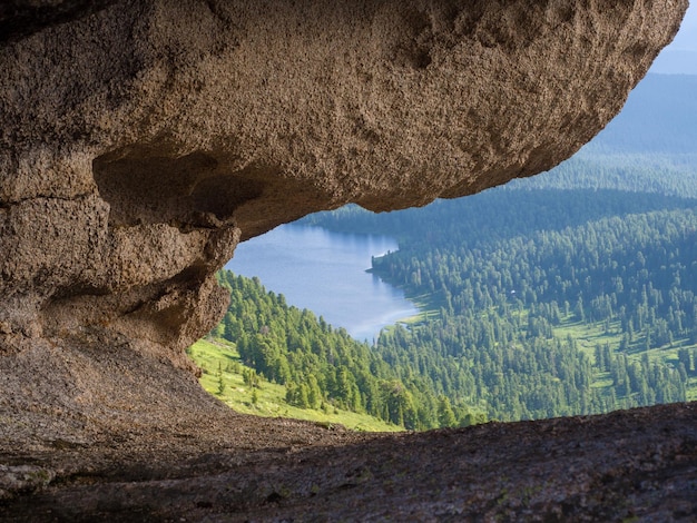 View through a window in the rock in the Natural Park Ergaki