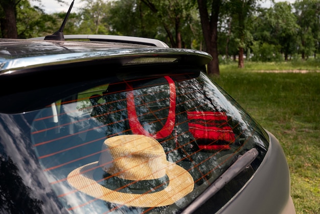 Photo view of travel items inside car ready for trip