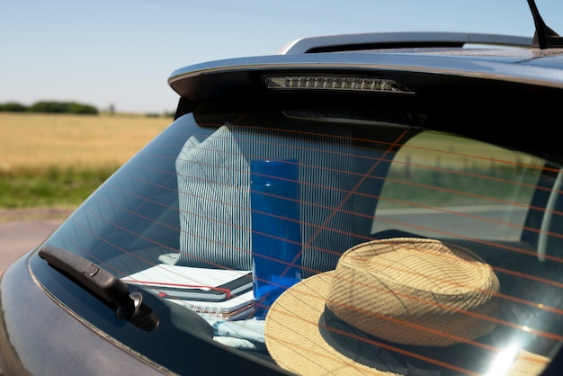 Photo view of travel items inside car ready for trip