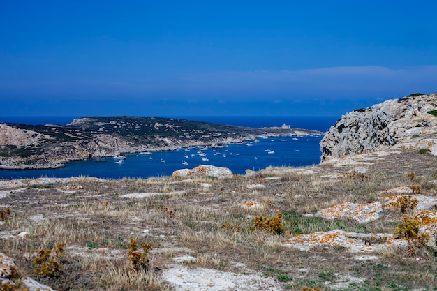 View of the Tremiti Islands. San Domino island, Italy: scenic view of tipycal rocky coastline. Adriatic Sea. Puglia, Italy.