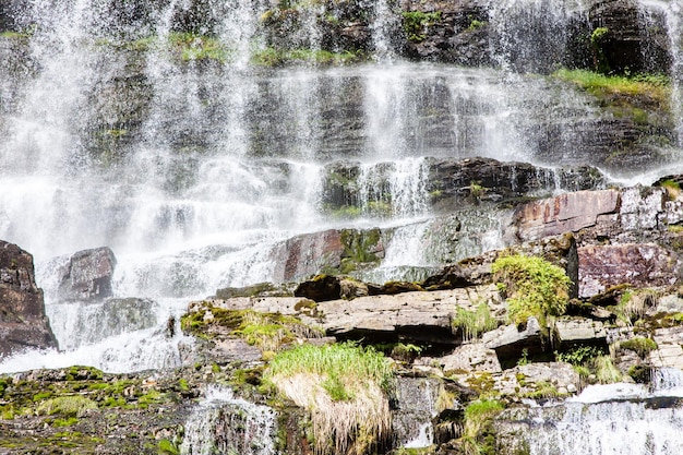 View of Tvindefossen or Tvinnefossen waterfall near Voss in Norway