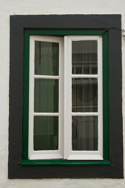 View of a typical european window of a building in the city.