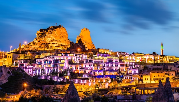 View of Uchisar with the castle at sunset in Cappadocia, Turkey