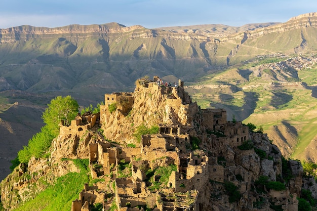 View of the uninhabited village of Gamsutl on top of a mountain in Dagestan the inhabited village of Chokh is visible in the distance