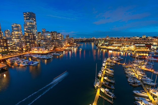 View of Vancouver downtown skyline at sunset time False Creek Harbour British Columbia Canada