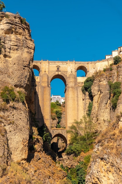 View of the viewpoint of the new bridge in Ronda province of Malaga Andalusia vertical photo