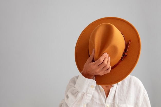 View of woman wearing stylish fedora hat