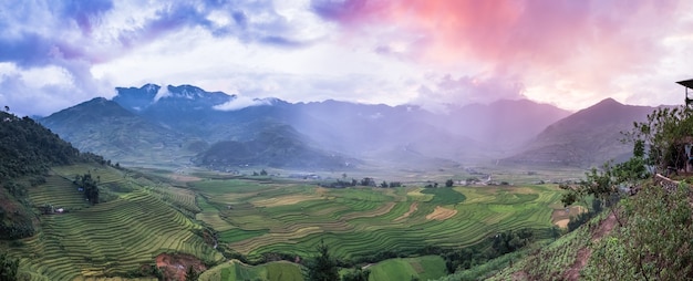 Viewpoint panorama of rice field terraced and mountain at colorful sunset in Tule, Yen bai