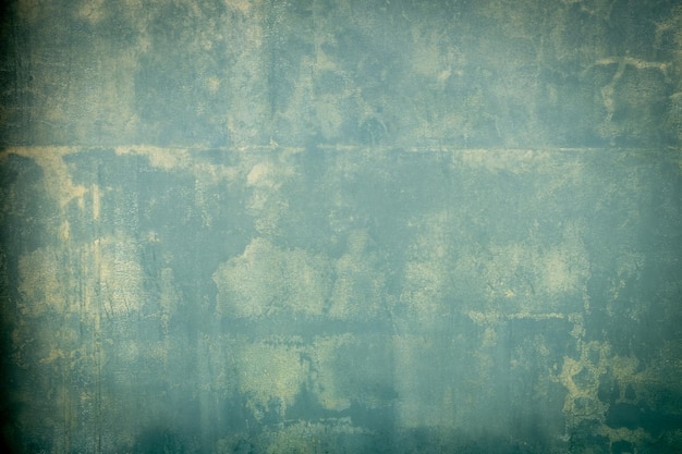 Vignette of green vintage wall backdrop texture background Grunge green background distressed paint