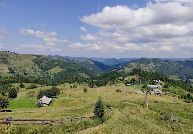 Village in the mountains in summer Panorama of the mountain on a sunny day Sunny summer