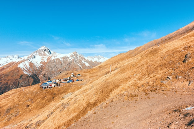 Village on the mountainside in autumn Ski resort in the offseason