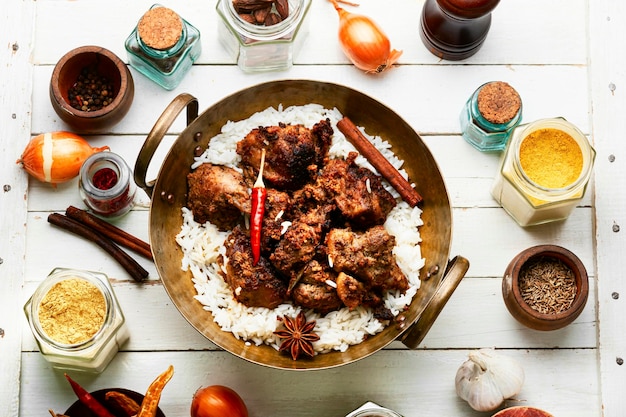 Vinegar marinated pork stewed in Indian spices vindaloo