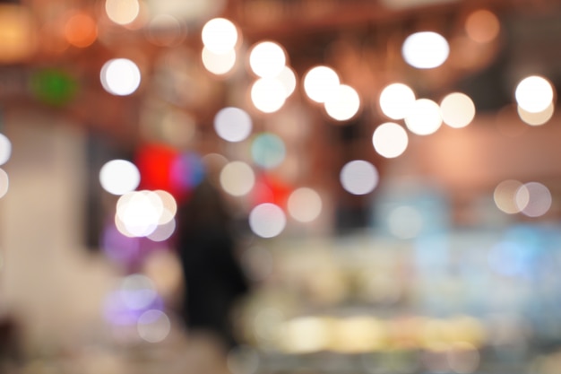 Vintage abstract blurred image of cafe's hallway with bokeh