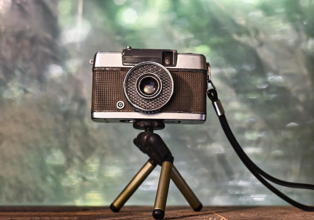 Vintage camera standing on a tripod