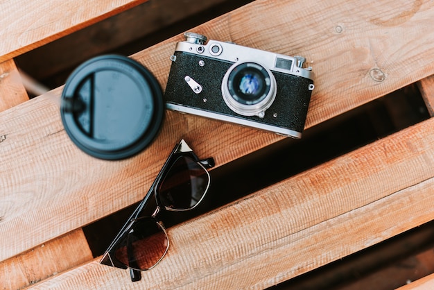 Vintage camera on a wooden surface