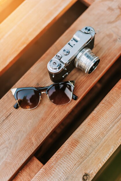 Vintage camera on a wooden surface