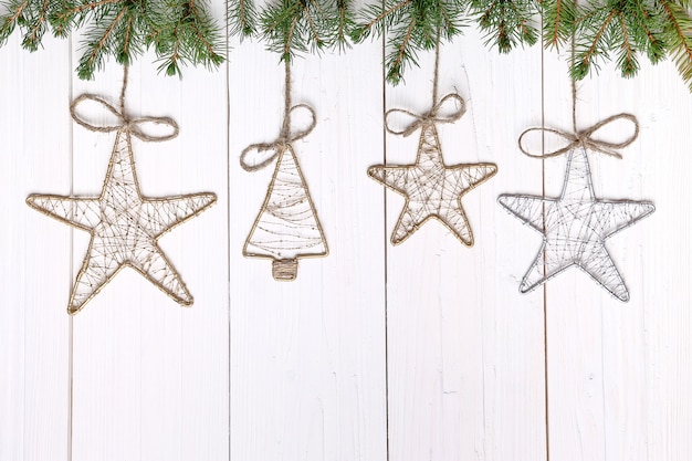 Vintage Christmas decorations on a light wooden background