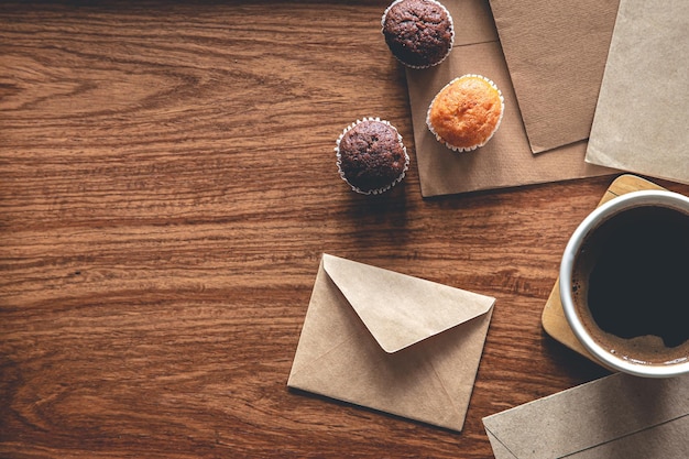 Vintage composition with envelopes on wooden background flat lay