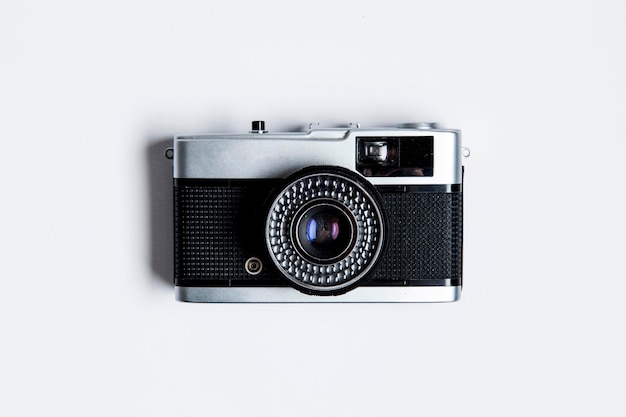 Vintage film camera on a white background