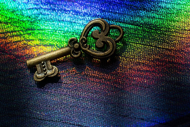 Vintage key Antique key Retro key on on colorful fabric