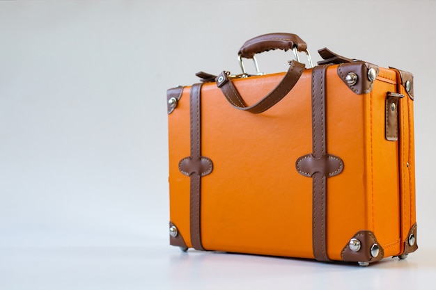 Vintage leather suitcase isolated on white background