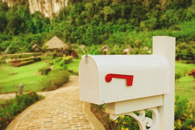 Photo vintage mail box on country home.