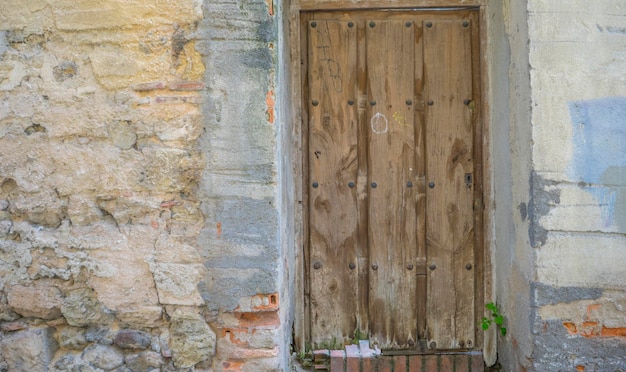 Vintage, medieval door Spanish city of Segovia. Old wooden entrance. ancient architecture