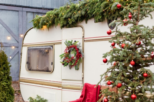 Vintage old trailer with Christmas decorations