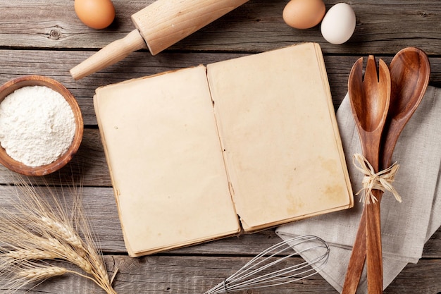 Vintage recipe book utensils and ingredients