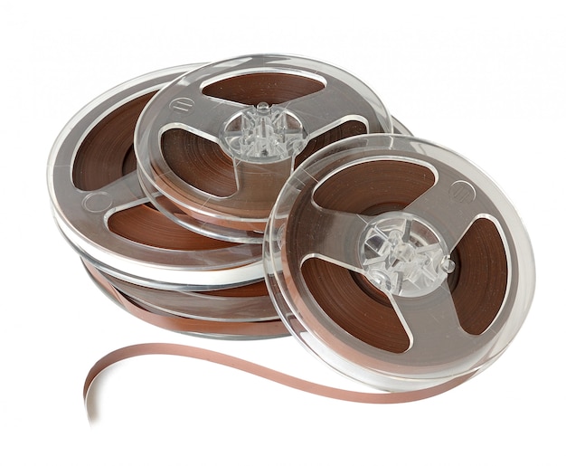 Vintage reels of audio magnetic tape isolated