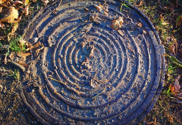 Vintage sewer lid object background