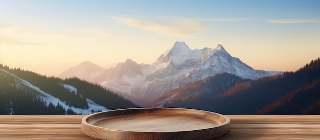 Vintage style concept where wooden plate on a table with a blurry mountain background providing