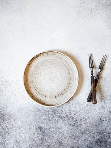 Vintage table setting with plate and forks