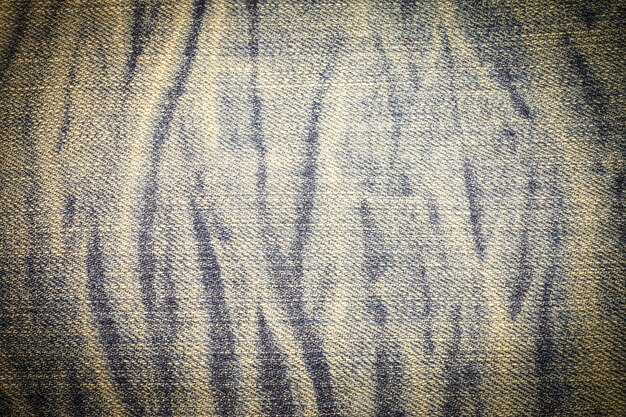 Photo vintage texture of blue jeans.