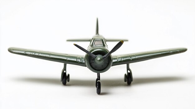 Photo vintage toy military airplane on white background for professional projects