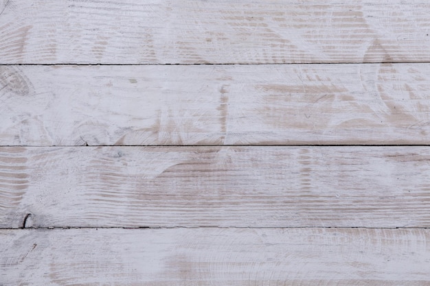 Vintage white wood background texture with knots and nail holes